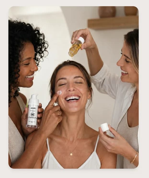 Three women sharing an ABBI skincare routine